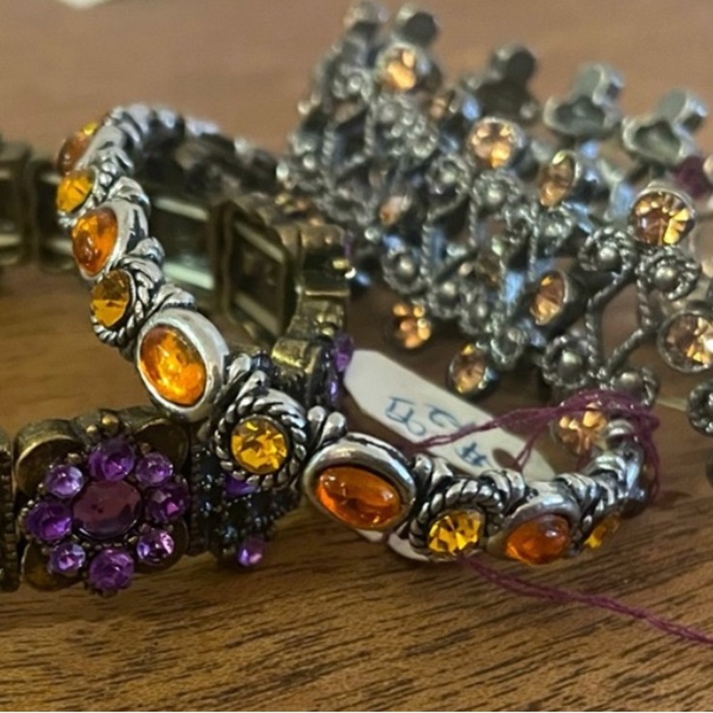 Elegant Silver Bracelets with Purple and Orange Accents